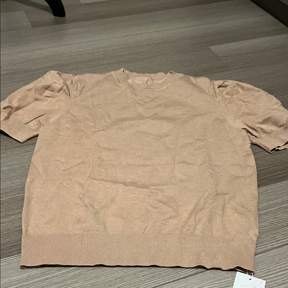 Woman’s Tan Sweater